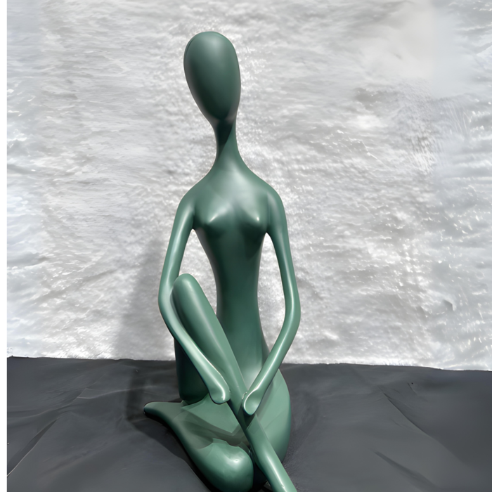 decorative statue in yoga pose